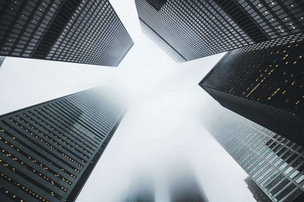 View looking up at skyscrapers from below to depict Operational effectiveness