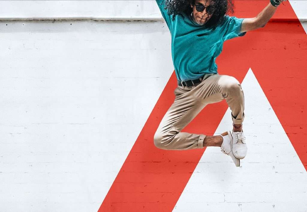 man in peak performance jumping